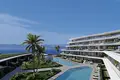 Wohnung in einem Neubau Wohnungen mit Meerblick in einer Wohnanlage am Strand in Çeşme