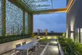 Kompleks mieszkalny High-rise residence with a swimming pool and lounge areas in a posh neighborhood of Bangkok, Thailand