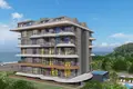 Kompleks mieszkalny New residential complex with swimming pools, a gym and a parking on the seafront, Kestel, Alanya, Türkiye