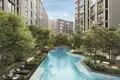 Complejo residencial Premier residential complex with a huge swimming pool and lush green areas in Suan Luang, Bangkok, Thailand