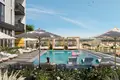 Complexe résidentiel The Portman residential complex with a swimming pool and lounge areas close to Burj Khalifa and Dubai Marina, JVC, Dubai, UAE