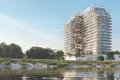 Residential complex New residence Samana Lake Views with swimming pools and lounge areas close to a highway, Production City, Dubai, UAE