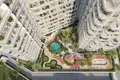 Kompleks mieszkalny New complex of furnished apartments Cove Grand with swimming pools, lounge areas and mini golf, Dubai Land Residence Complex, UAE