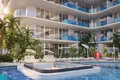 Residential complex New residence Samana Lake Views with swimming pools and lounge areas close to a highway, Production City, Dubai, UAE