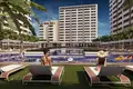 Wohnkomplex New residence with an aquapark, swimming pools and a tennis court at 150 meters from the beach, Mersin, Turkey