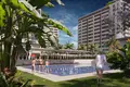 Wohnkomplex New residence with an aquapark, swimming pools and a tennis court at 150 meters from the beach, Mersin, Turkey
