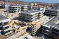 Wohnung in einem Neubau Wohnungen in Meeresnähe in einer bewachten Anlage in Çeşme
