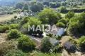 Дом  Магоуладес, Греция