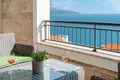 A luxurious two-bedroom apartment 124m2 with an open view of the sea and a swimming pool is for rent in Tivat, Luštica.