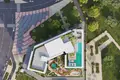 Kompleks mieszkalny New complex of furnished apartments Cove Grand with swimming pools, lounge areas and mini golf, Dubai Land Residence Complex, UAE