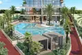 Wohnkomplex New residence Enqlave by Aqasa with a swimming pool, lounge areas and a conference room, Discovery Gardens, Dubai, UAE