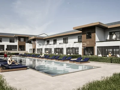 Zespół mieszkaniowy Duplex apartments 3+1 in Ölüdeniz, Fethiye — marketable options with a rental guarantee and an installment plan from the developer