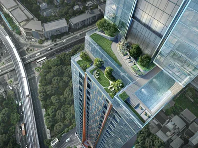 Wohnanlage High-rise residential complex with loft apartments next to the metro, in the business district of Bangkok, Thailand