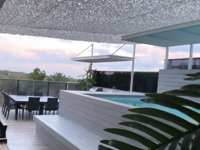 Barrio residencial Rez de jardin face mer avec piscine privee