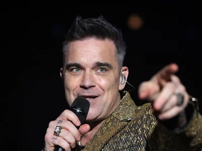 Robbie Williams plans to build a hotel in Dubai. Why?