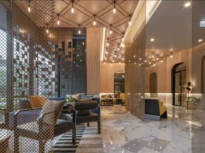 Wohnanlage High-rise residence with a swimming pool and lounge areas in a posh neighborhood of Bangkok, Thailand
