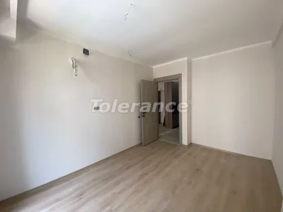 Wohnanlage Apartments 1+1 bezugsfertig in Arpachbahşiş, Mersin in einer Anlage mit Pool und in der Nähe des Meeres