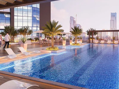 Complexe résidentiel High-rise residential complex with city views, close to the highway, Majan, Dubai, UAE