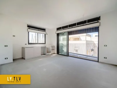 Quartier résidentiel Superbe 2 pieces avec mamad et parking devant le parc hayarkon