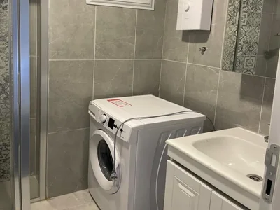 Zespół mieszkaniowy Umeblowany apartament 1+1 położony 400 metrów od morza w kompleksie Tekinoğlu.