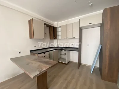 Wohnanlage Apartments 1+1 bezugsfertig in Arpachbahşiş, Mersin in einer Anlage mit Pool und in der Nähe des Meeres
