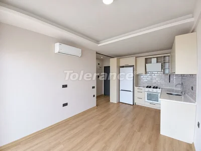 Complejo residencial New 1+1 apartment in Tece, Mersin, with household appliances and sea view