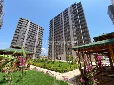 Wohnanlage Apartments 1+1 bezugsfertig in Arpachbahşiş, Mersin in einer Anlage mit Pool und in der Nähe des Meeres