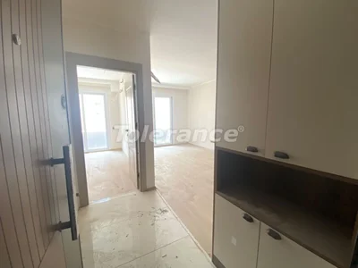 Wohnanlage Apartments 1+1 bezugsfertig in Arpachbahşiş, Mersin in einer Anlage mit Pool und in der Nähe des Meeres