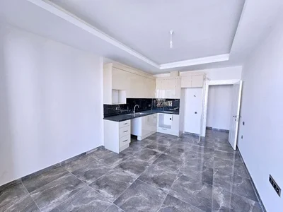 Zespół mieszkaniowy Apartament 1+1 w kompleksie Kurt Safir Flower 150 metrów od morza.