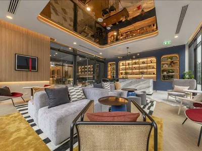 Wohnanlage High-rise residence with a swimming pool and lounge areas in a posh neighborhood of Bangkok, Thailand