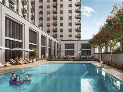 Complexe résidentiel New Odessa Residence with a swimming pool, tennis courts and lounge areas 5 minutes away from the park, Town Square, Dubai, UAE