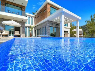 Zespół mieszkaniowy Villa with two swimming pools, a garden and a kids' playground, Kalkan, Turkey