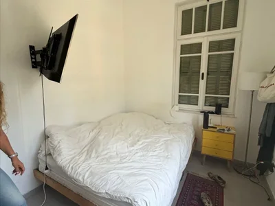 Dzielnica mieszkaniowa Charmant appartement de 3 pieces dans un immeuble historique rue montefiore