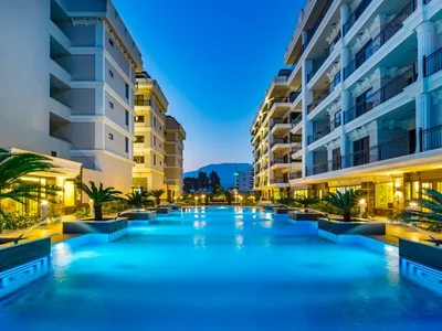 Zespół mieszkaniowy Furnished 1+1 apartment in Toprak Palace complex on the seafront.
