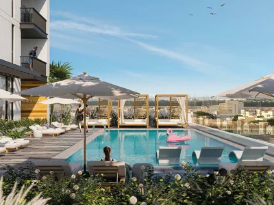 Zespół mieszkaniowy The Portman residential complex with a swimming pool and lounge areas close to Burj Khalifa and Dubai Marina, JVC, Dubai, UAE