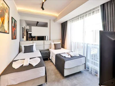 Wohnanlage Complex of villas with swimming pools and lounge areas close to the beach, in the center of Fethiye, Turkey