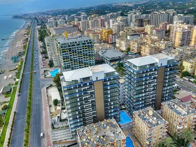 Edificio de apartamentos Bienes raíces frente al mar con impresionantes vistas en Mahmutlar
