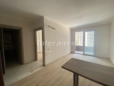 Wohnanlage Apartments 1+1 bezugsfertig in Arpachbahşiş, Mersin in einer Anlage mit Pool und in der Nähe des Meeres