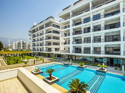 Zespół mieszkaniowy Furnished 1+1 apartment in Toprak Palace complex on the seafront.