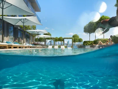 Complexe résidentiel New residence Ozone 1 with a swimming pool and a parking close to highways and Palm Jumeirah, JVC, Dubai, UAE