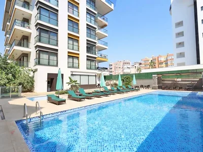 Zespół mieszkaniowy Umeblowany apartament 1+1 w kompleksie Granada Boutique, 50 metrów od morza.