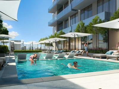 Complexe résidentiel New residence Ozone 1 with a swimming pool and a parking close to highways and Palm Jumeirah, JVC, Dubai, UAE