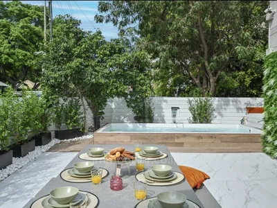 Dzielnica mieszkaniowa Appartement jardin unique avec piscine privEe et parking